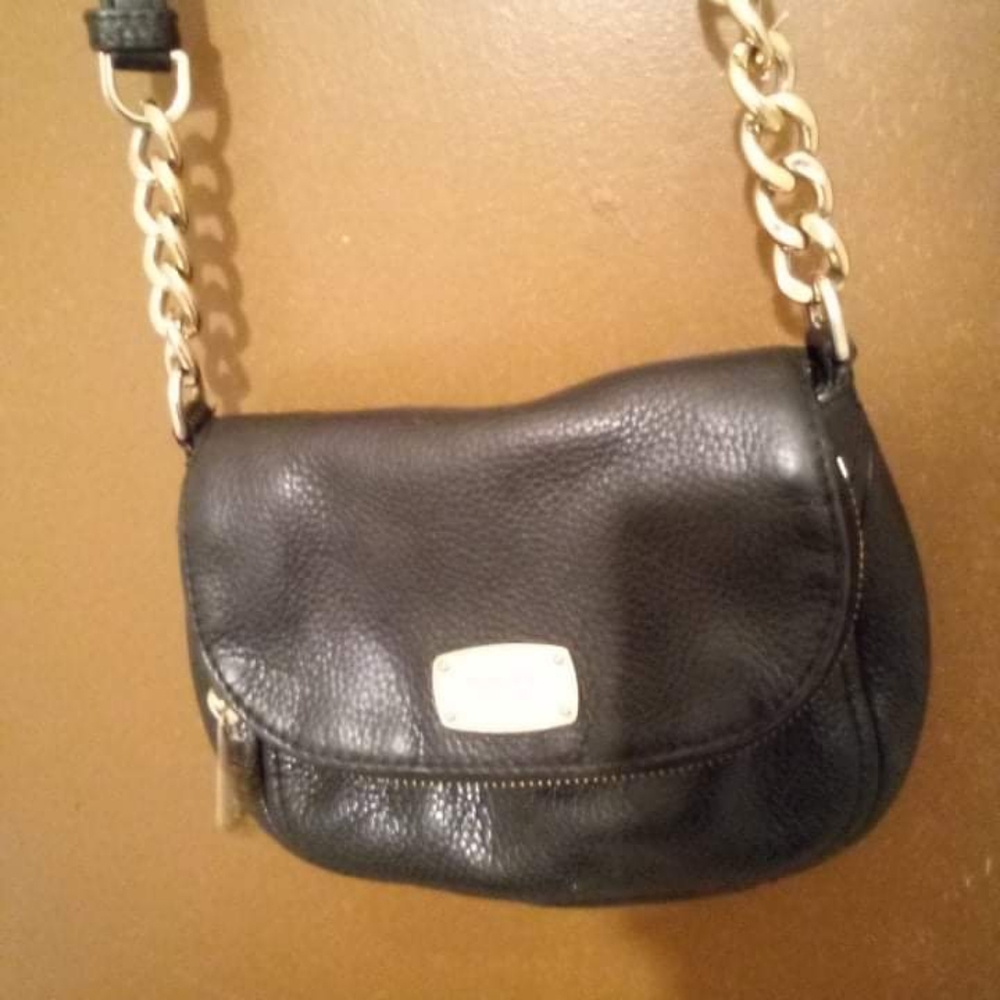 Michael kors crossbody purse$66.00 plus shipping comes out to 7 maybe 8 bucks